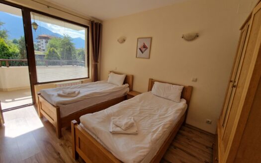 Spacious and bright 1-bedroom apartment, in a well managed SPA complex, close to the Gondola Ski lift in Bansko, beautiful mountain views