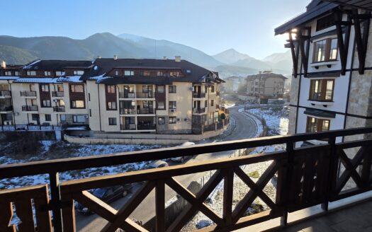 South-facing 1-bedroom apartment, with log fireplace in a new Residential building close to the City park in Bansko